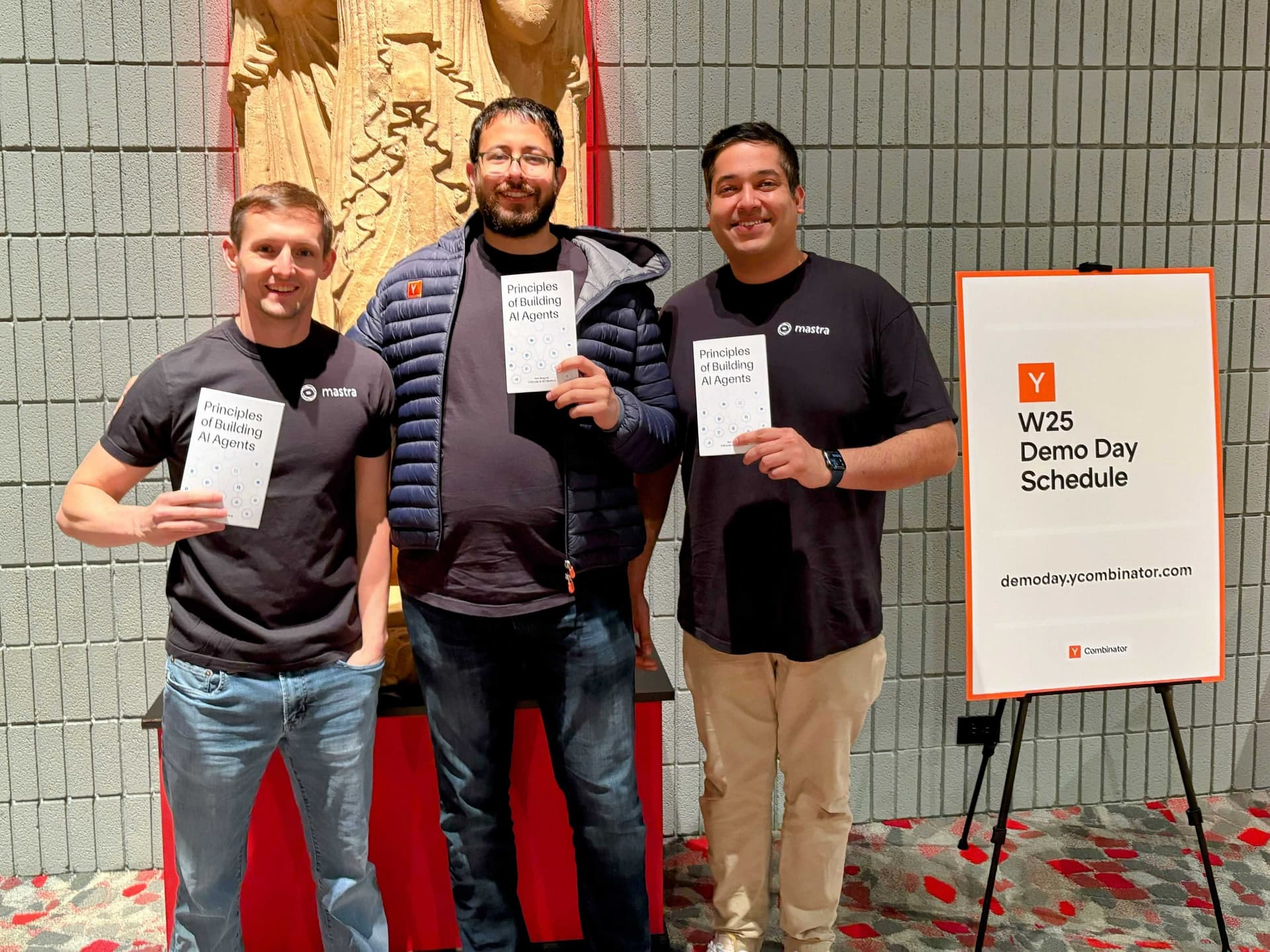 Sam, Shane, and Abhi with the Principles of Building AI agents book