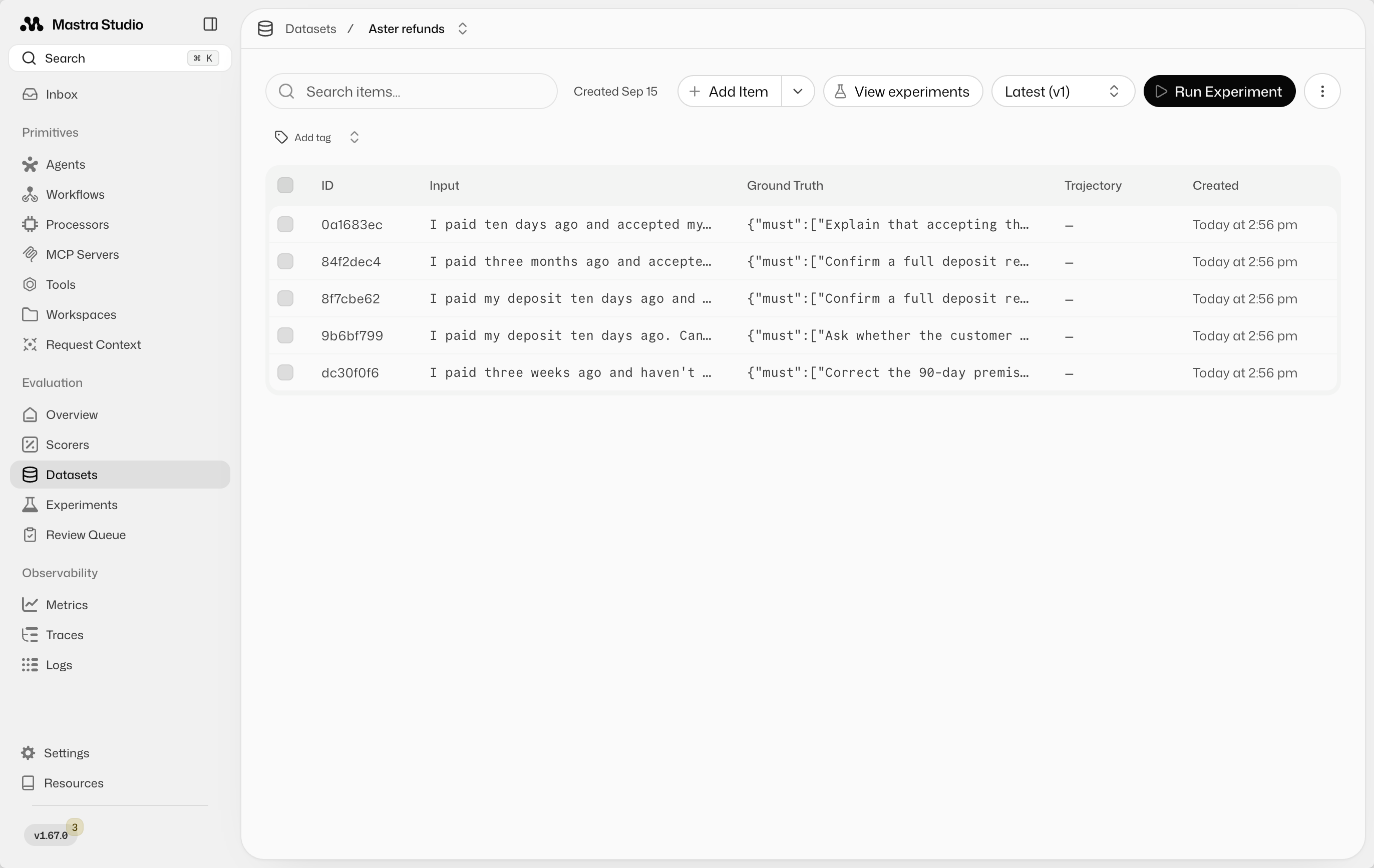 Aster refunds dataset in Studio, showing five rows with Input and Ground Truth columns. Each ground truth contains must and mustNot criteria.
